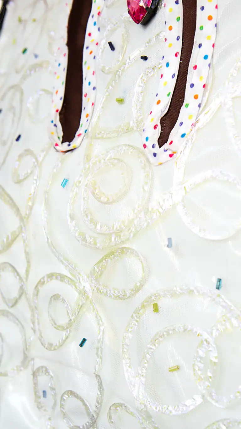 Designs Elijah's Sundae costume, closeup of shirt detail swirls.