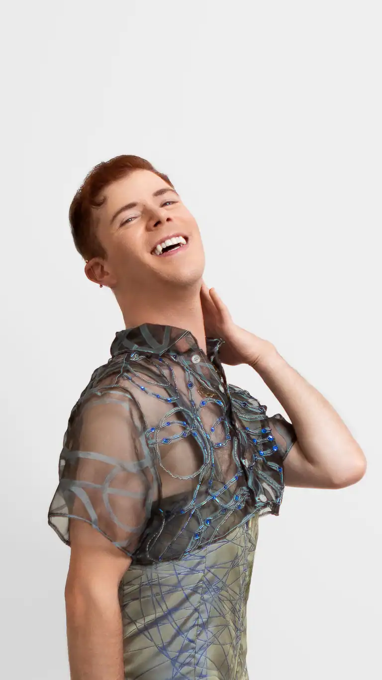 Designs Sexy romper design with detailed luxury fabric and shawl, closeup of sheer coverup.