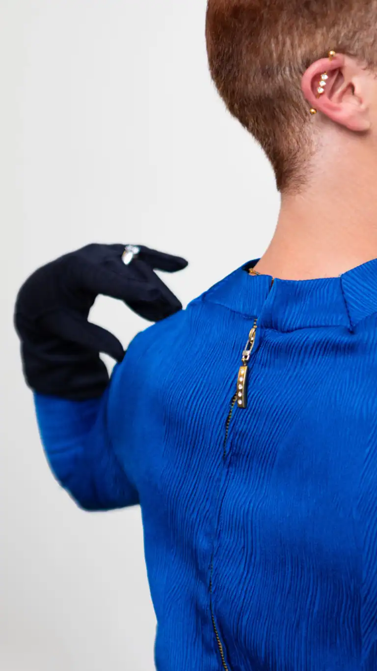 Designs Zipper detail with sparkles on Elijah's blue feminine mens fashion.